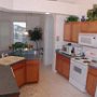 The open plan Kitchen comes complete with Oven, Microwave, and as well as a spacious fridge that features a freezer compartment with Ice maker. A selection of cutlery, plates and glasses are also provided.