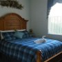 Second Bedroom, features a Queen sized bed as well as TV and access to an ensuite bathroom.
